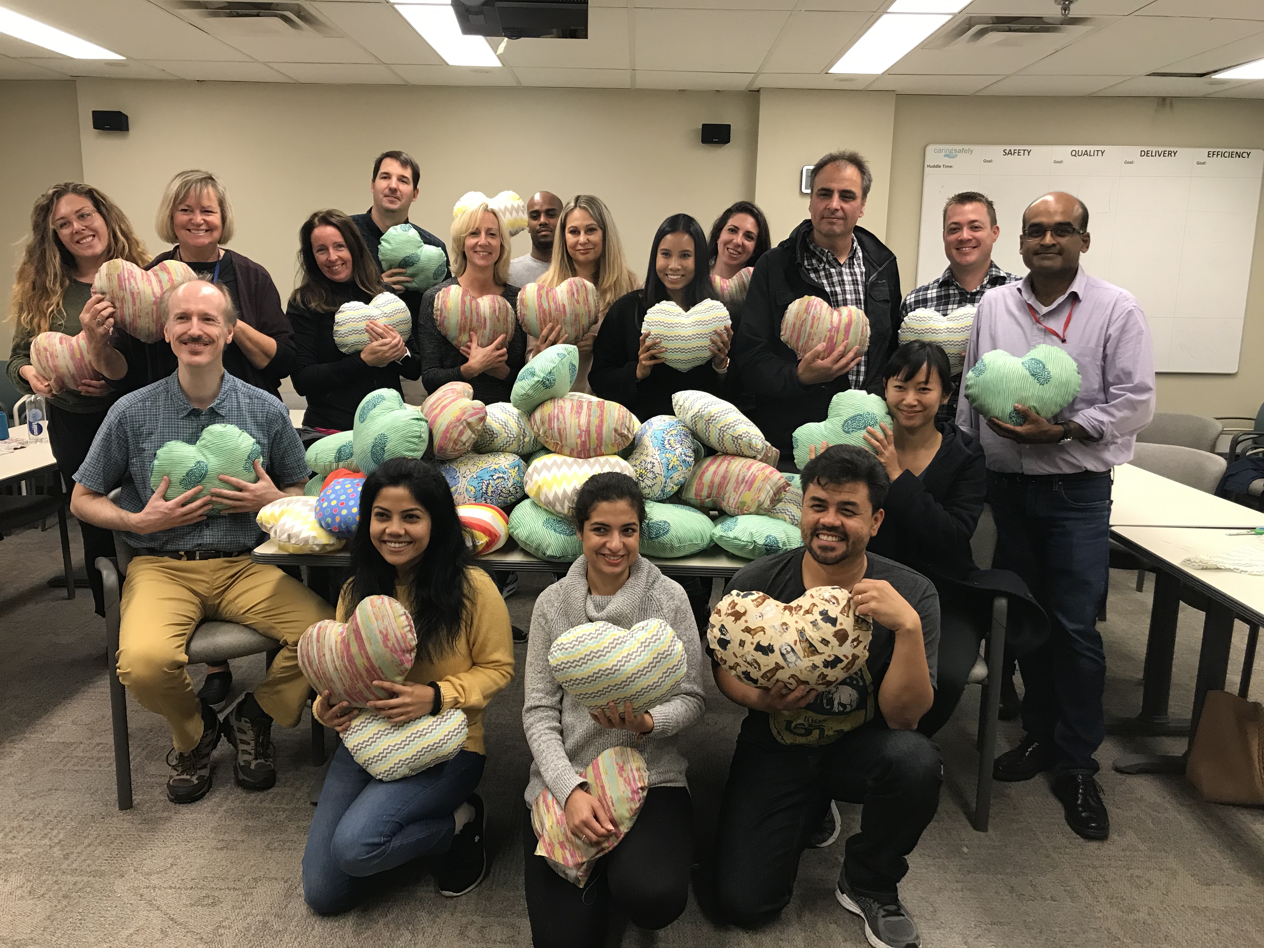 Volunteers sew pillows for patients 