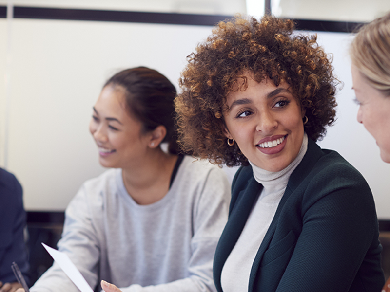 smiling woman in a meeting